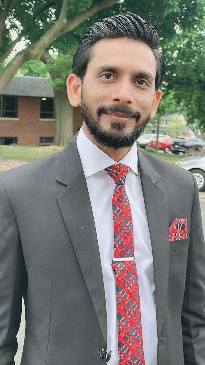Rev. Dr. Muazzam John, Principal